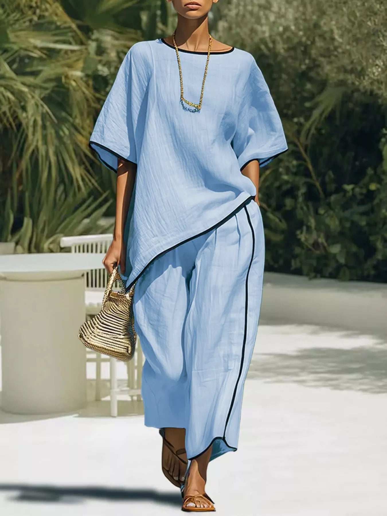 Sky blue round-neck top and matching pants set with black contrast piping