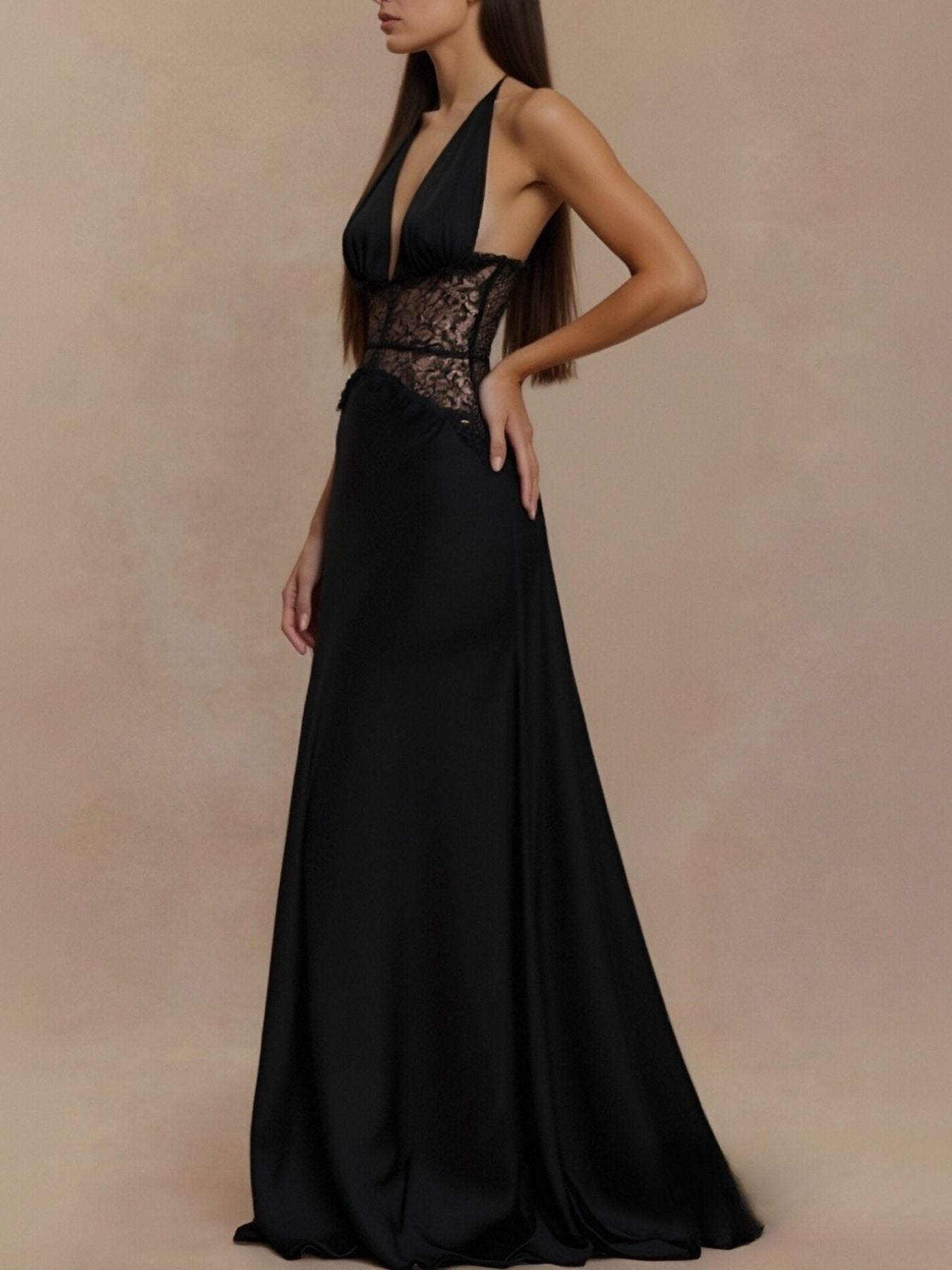 Black halter neck maxi dress with lace bodice and flowing floor-length skirt