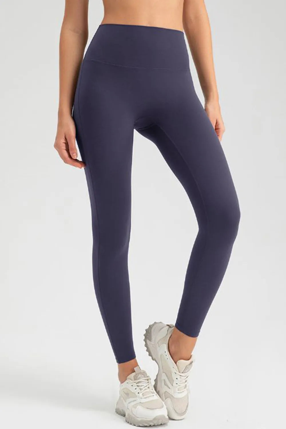 High-waist skinny active pants in dark navy, full-length, snug athletic fit