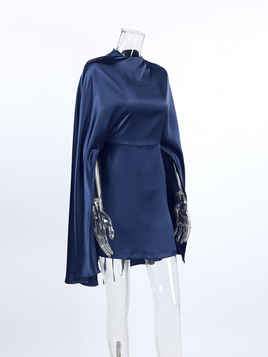 Navy mock neck cape sleeve mini dress on mannequin, draped sleeves and shoulder volume