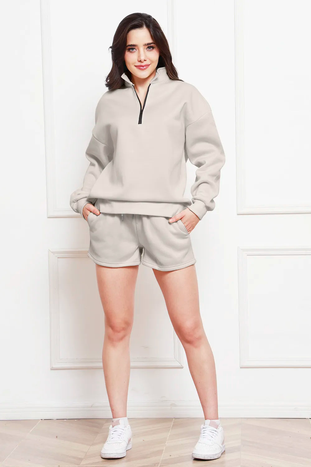 Ivory half-zip long sleeve sweatshirt and drawstring shorts set, front view