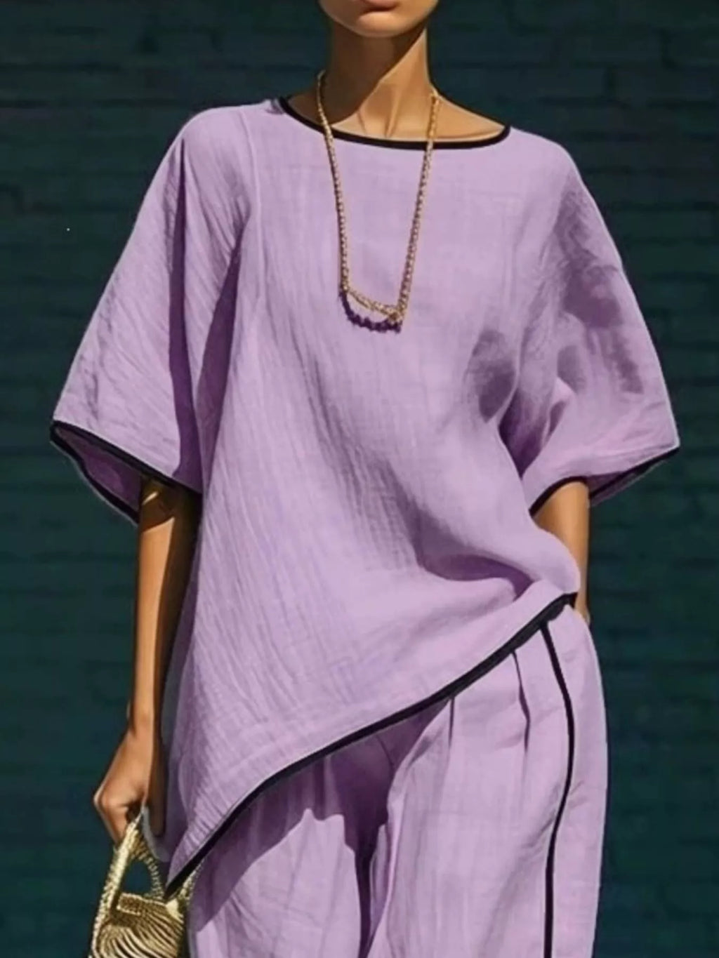 Lavender purple round-neck top and wide-leg pants set with black-trim diagonal hem