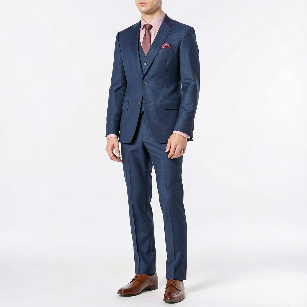 Men's blue tonal windowpane suit with pink dress shirt and burgundy striped tie