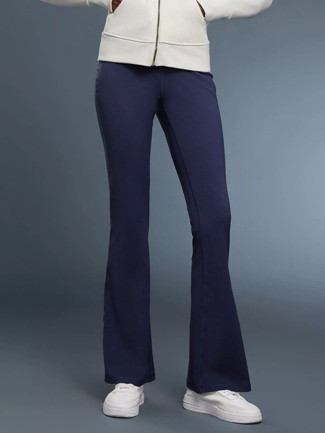 Dark blue high-waisted flare active pants with wide straight-to-flare legs