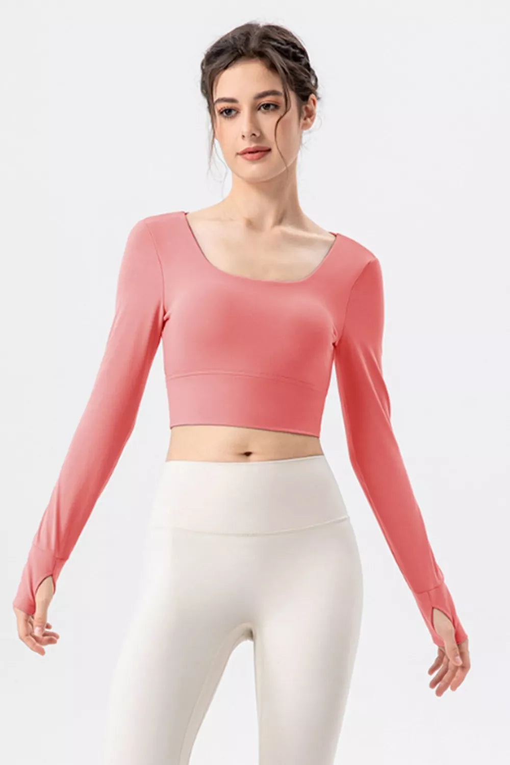 Hot pink square-neck long-sleeve active crop top with cropped waist hem