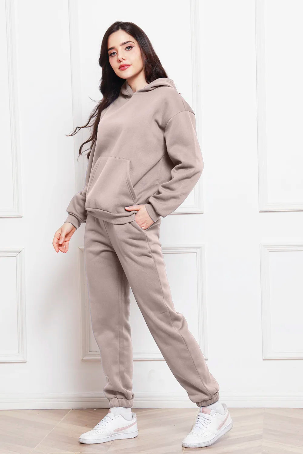 Taupe drop-shoulder hoodie and jogger pants set, side view with drawstring hood