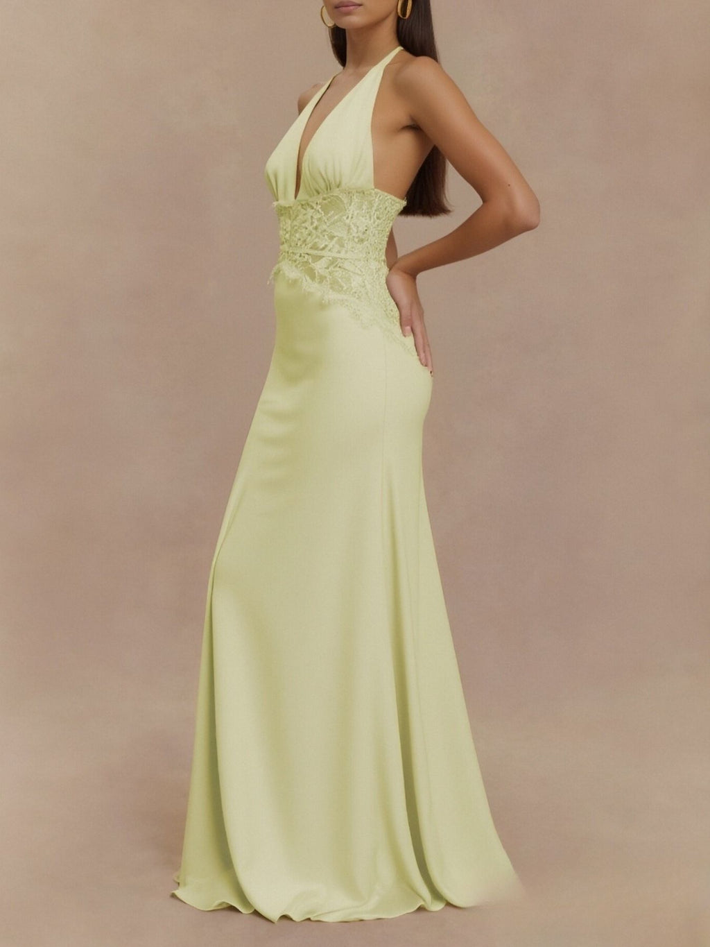 Light yellow halter maxi dress with lace bodice and fitted waist, side view long skirt