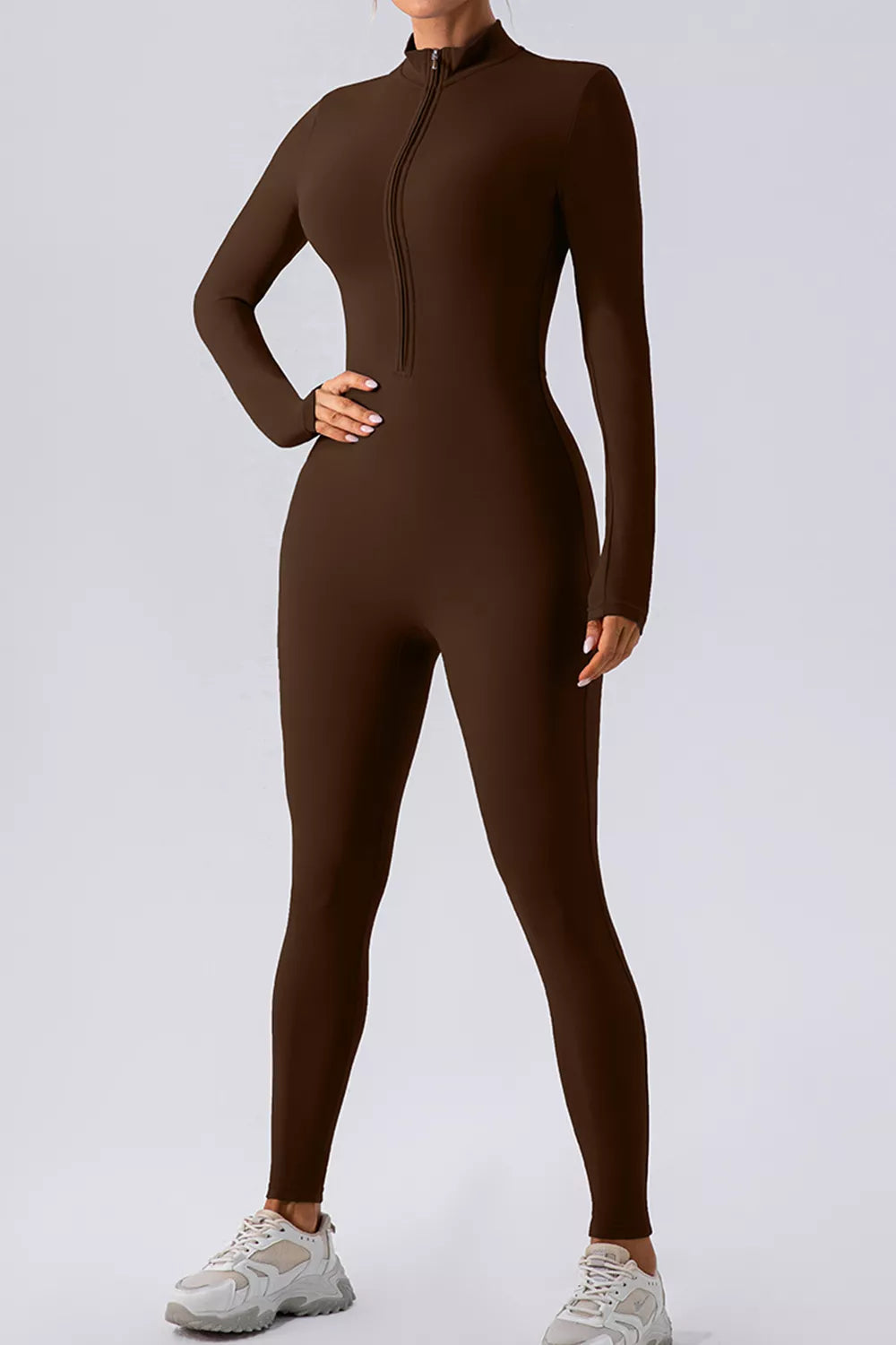 Chocolate brown active jumpsuit with mock neck half-zip front, long sleeves, full-length legs