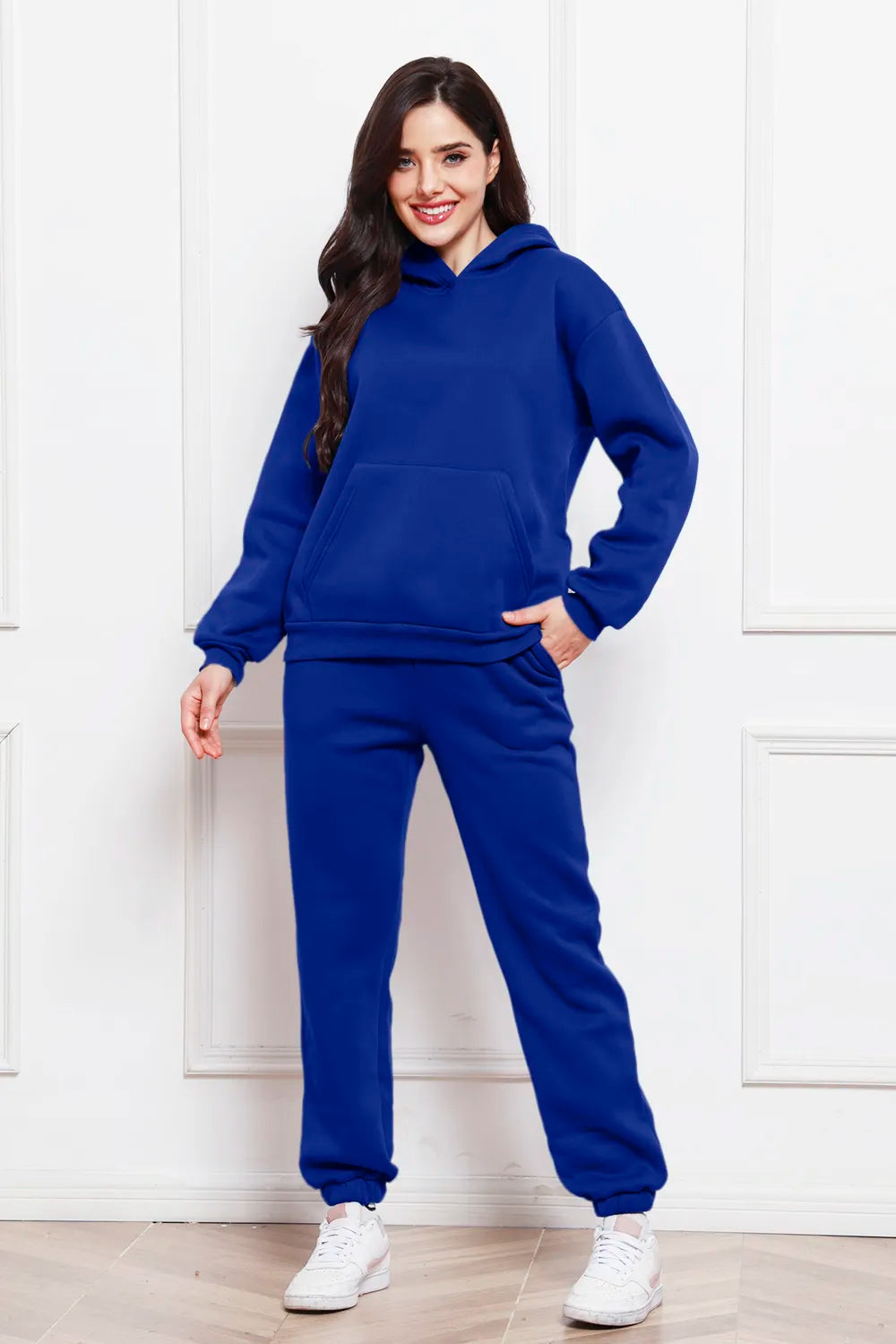 Hoodie and pants set in dark blue with kangaroo pocket and drawstring hood