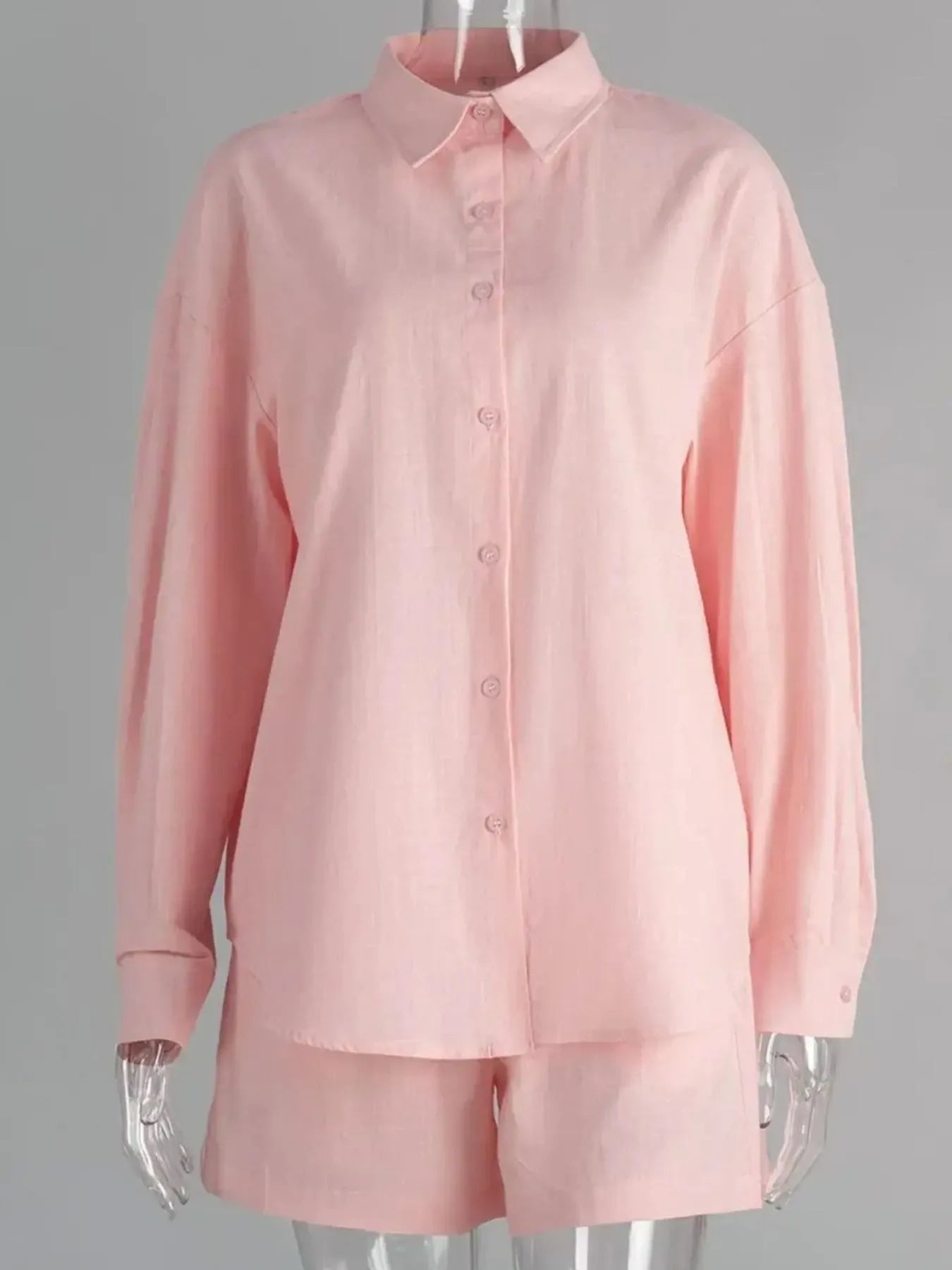 Light pink button-up long-sleeve shirt and matching shorts set, mannequin front