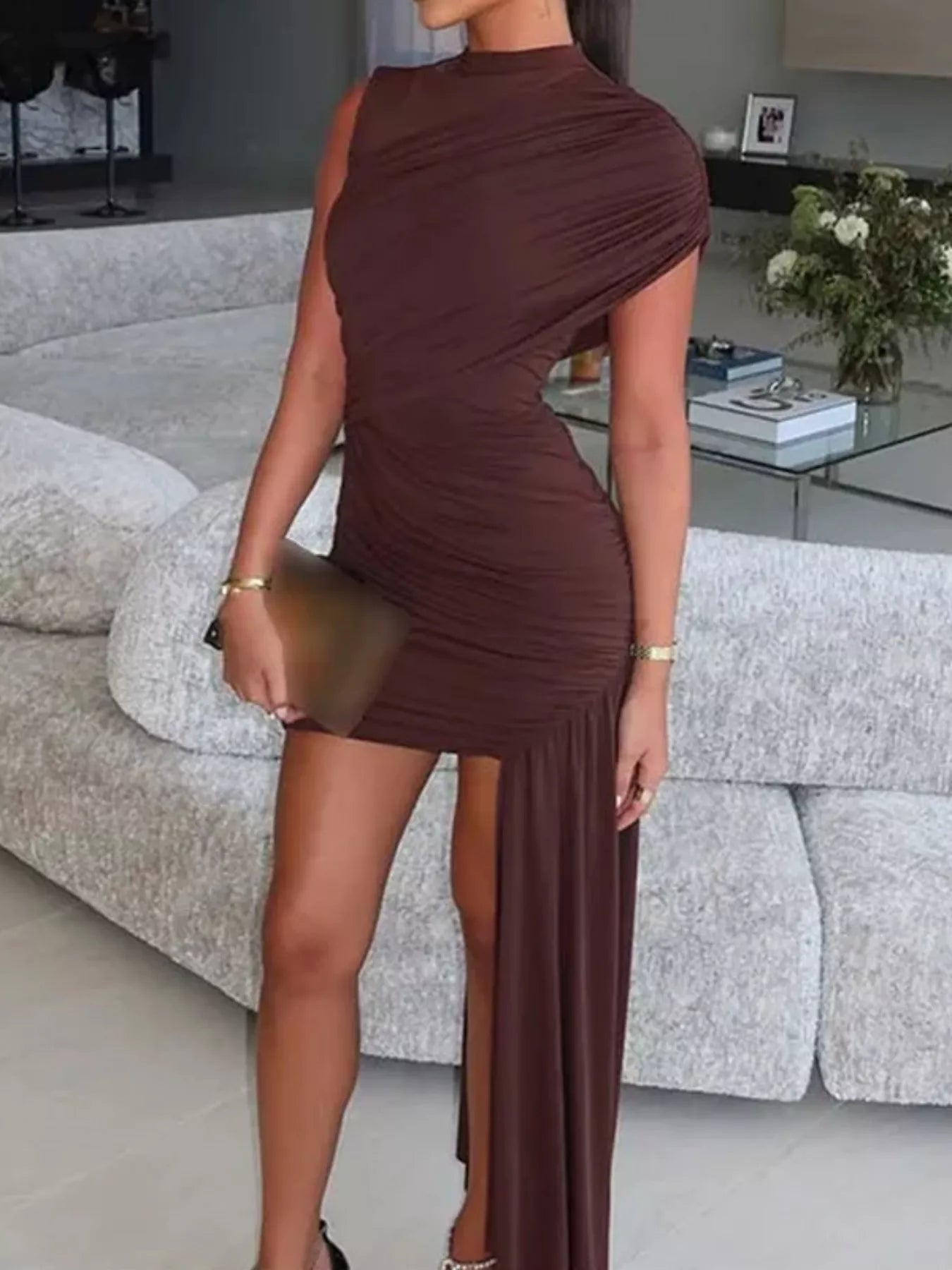 Dark brown ruched asymmetrical mock neck dress with draped one-shoulder detail