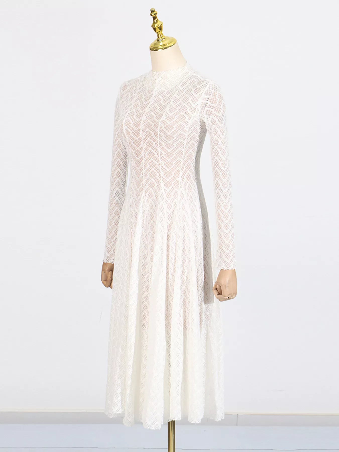 White lace mock-neck maxi dress on mannequin, back view with long sleeves