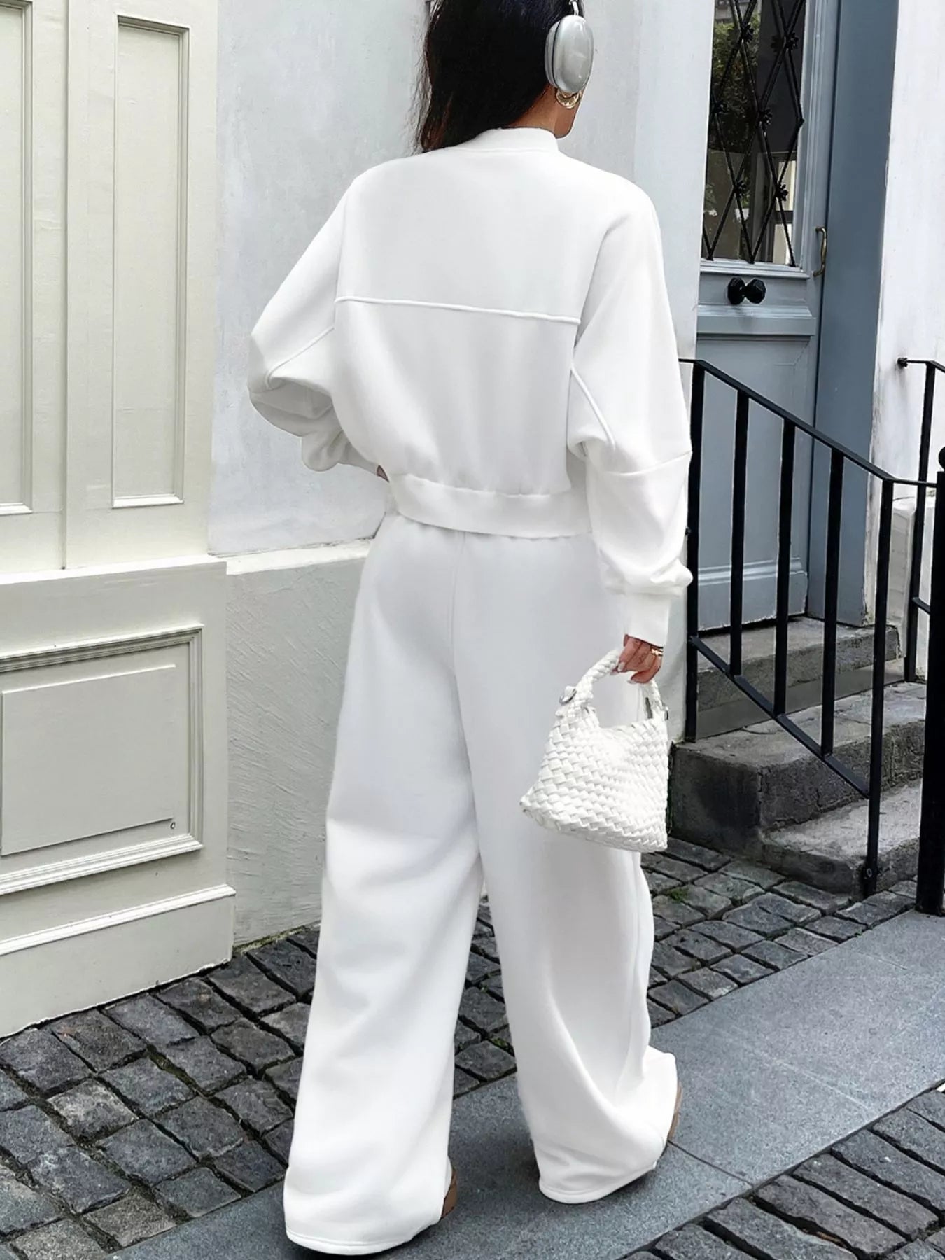 White zip-up jacket and wide-leg pants set, back view