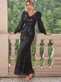 Black sequin V-neck maxi dress with lantern sleeves, fitted column silhouette