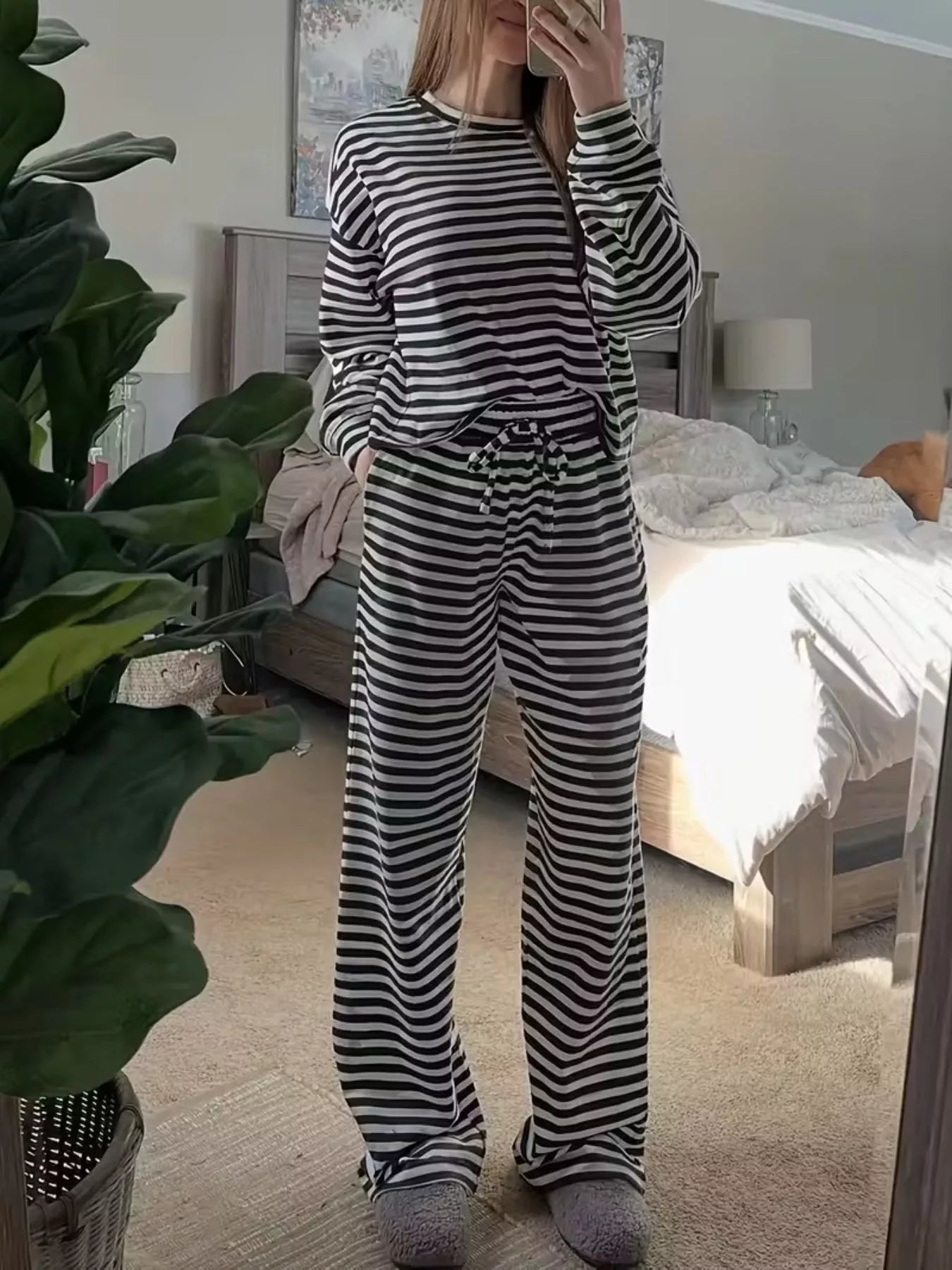 Black-and-white striped lounge set with crew-neck long sleeve top and full-length pants