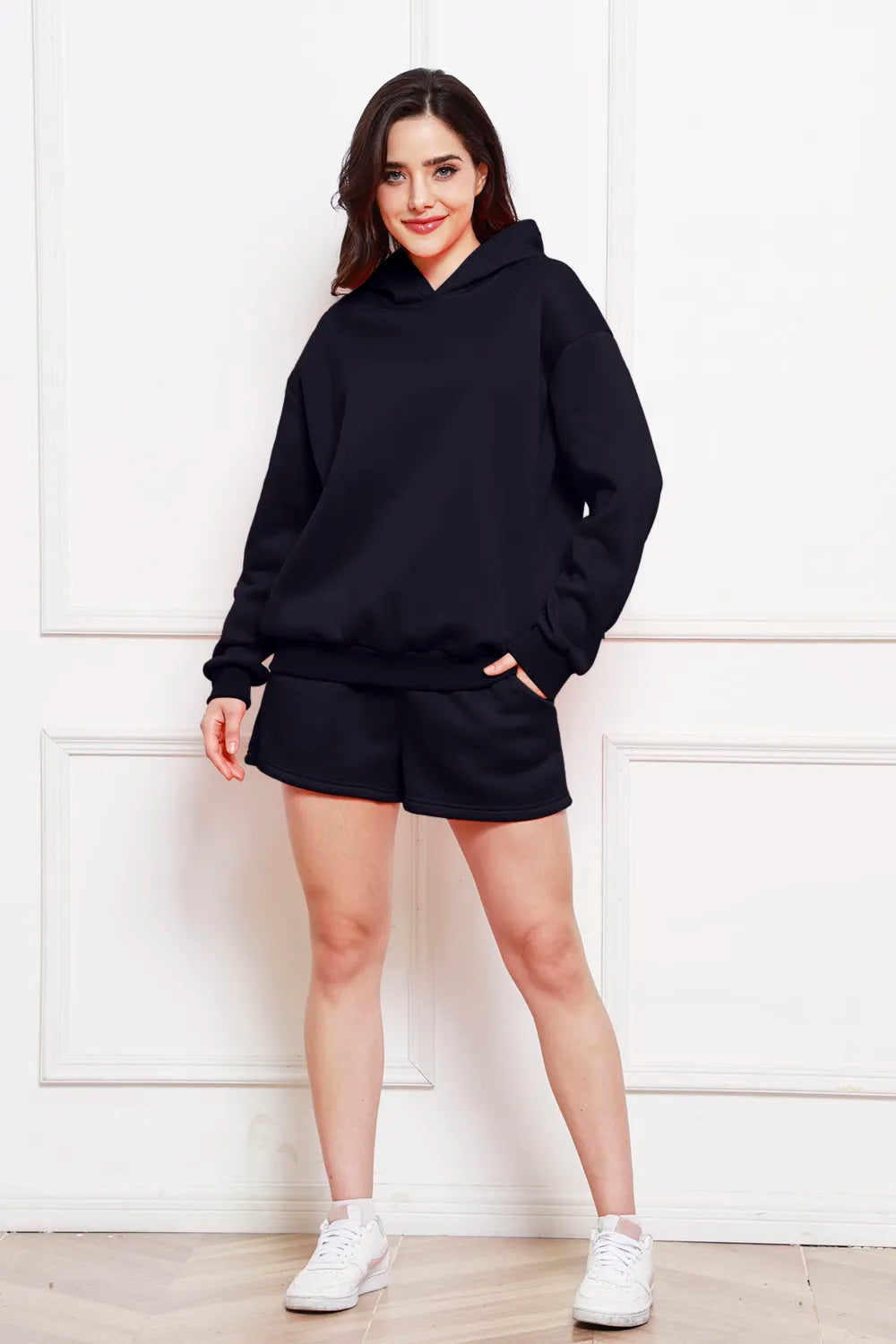 Dark navy hoodie and matching shorts set with drawstring hood, front view