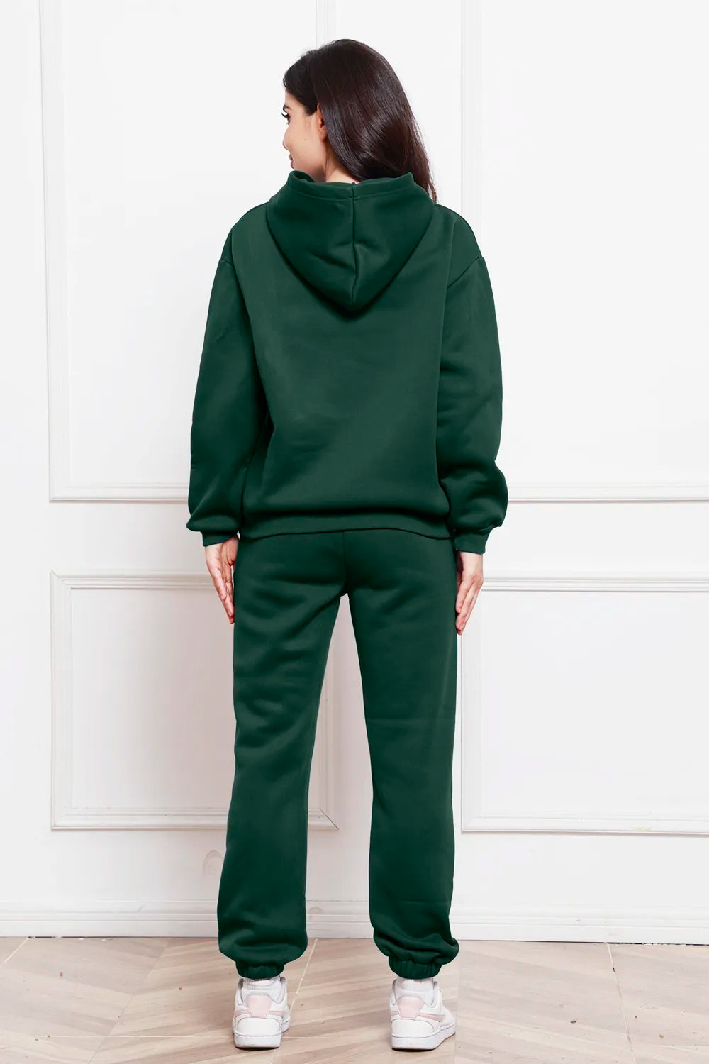 Dark green drop-shoulder pullover hoodie and jogger pants set, drawstring hood, kangaroo pocket