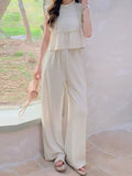 Apricot ruffled sleeveless top and wide-leg pants set with tiered top