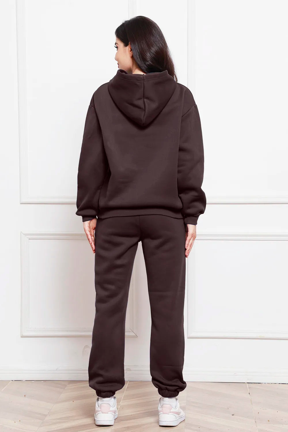 Dark brown drop-shoulder long-sleeve hoodie and jogger pants set, back view
