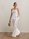 White strapless peplum top and wide-leg pants set, full body front view.