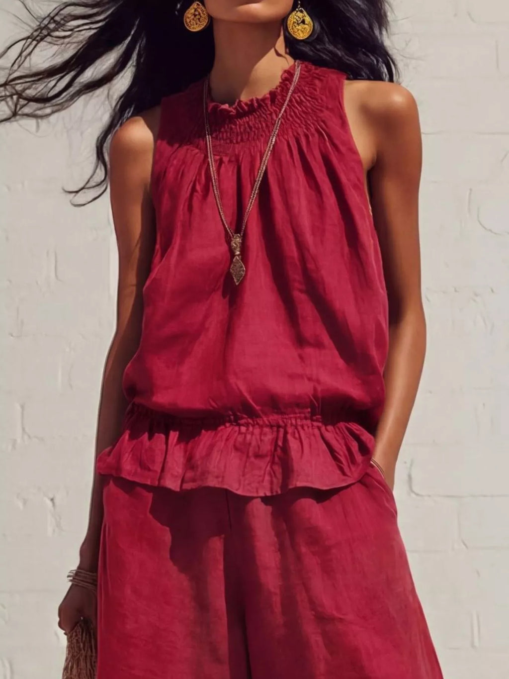 Scarlet smocked ruffled hem sleeveless top and wide-leg pants set, gathered neckline.