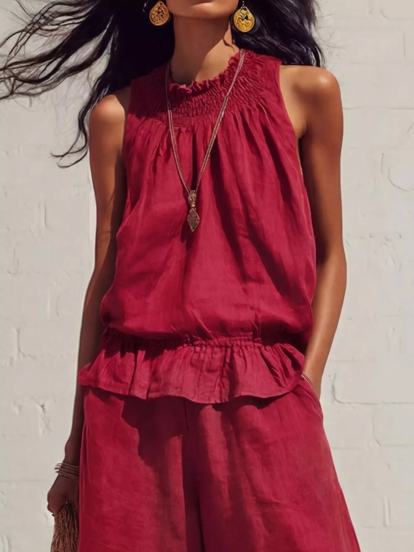 Scarlet smocked ruffled hem sleeveless top and wide-leg pants set, gathered neckline.