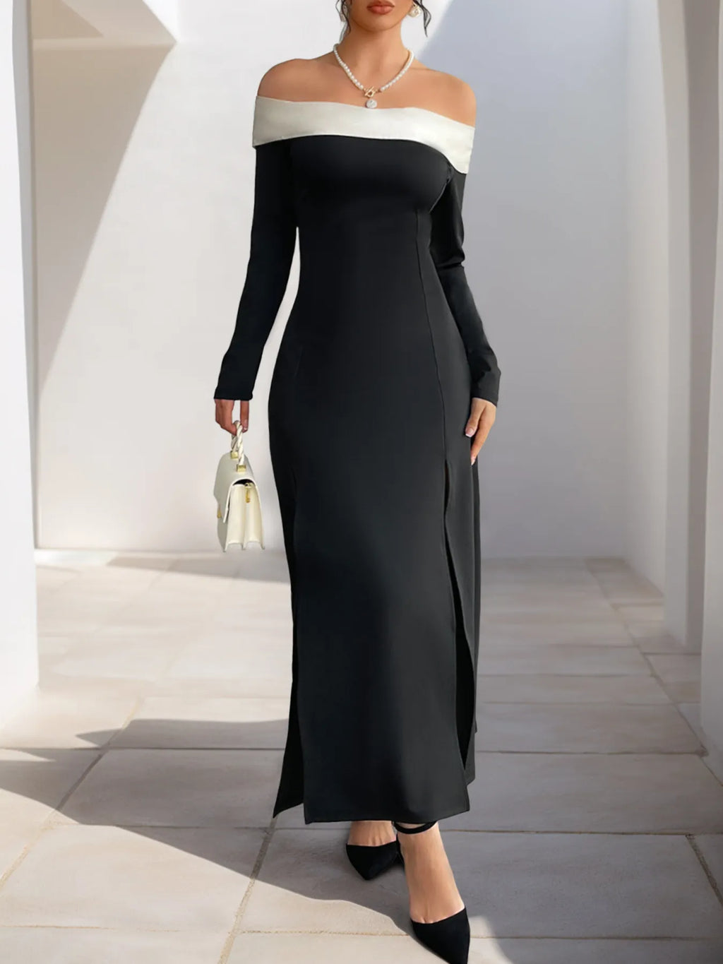 Black off-shoulder maxi dress with contrast neckline band and high side slit