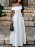 Off-shoulder A-line maxi dress in off-white, fitted bodice, wide neckline and flared skirt