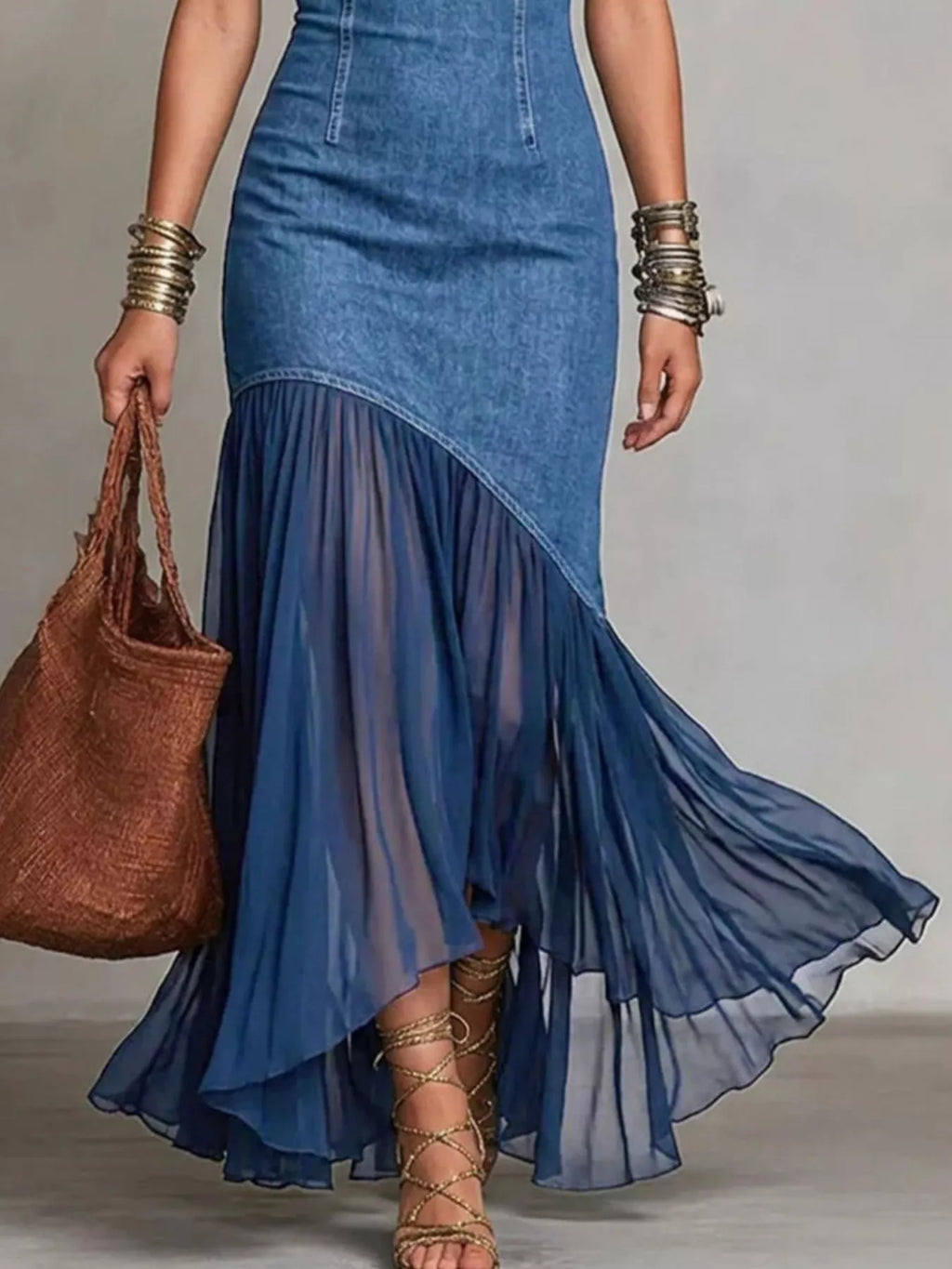 Blue cold-shoulder denim maxi dress detail: asymmetrical ruffle hem and skirt layers