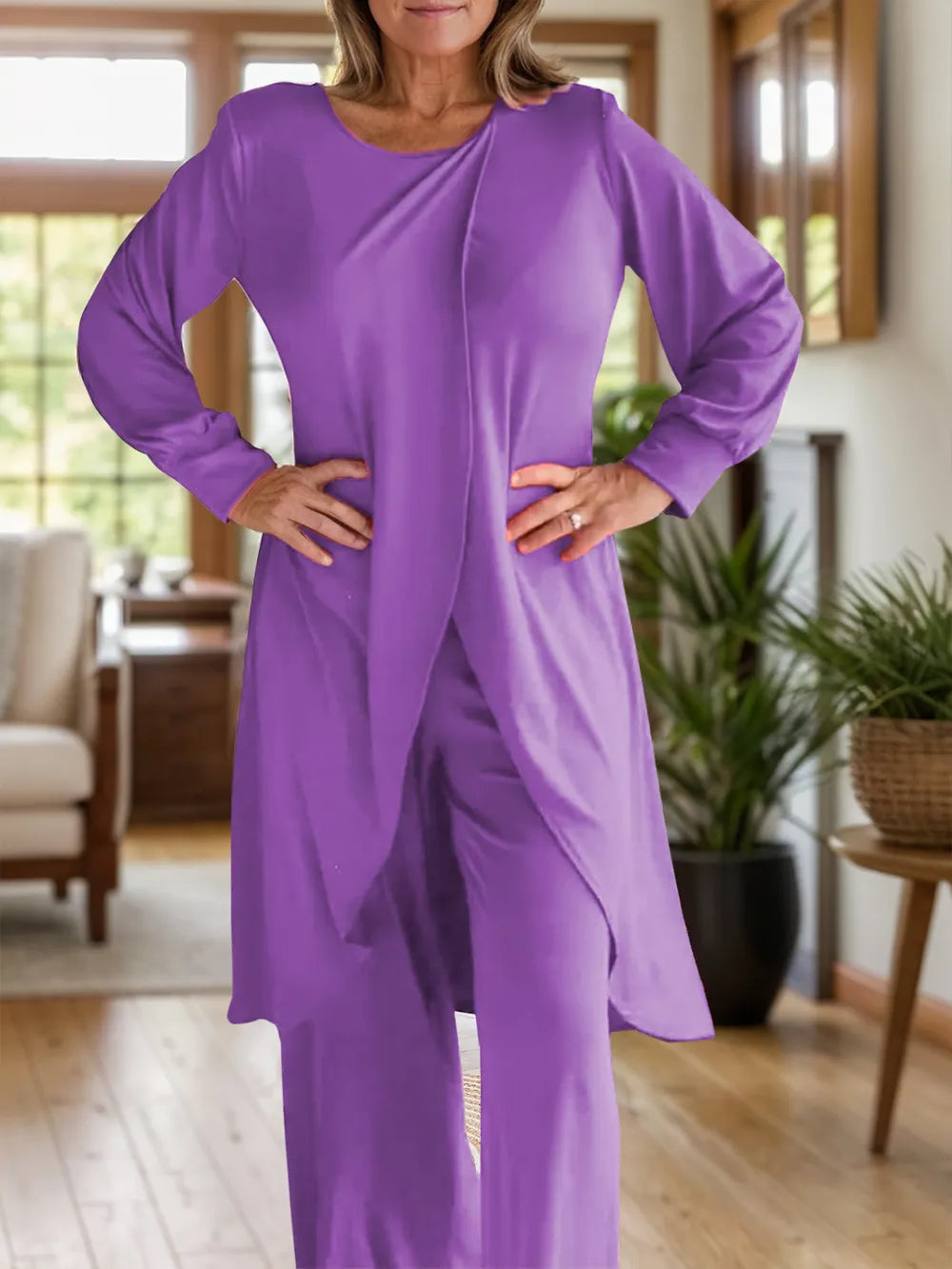 Purple long sleeve top and wide-leg pants set with draped front slit
