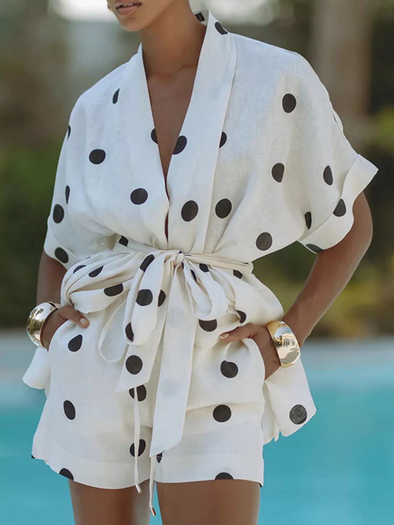 Polka-dot tie-waist set, white with black dots, V-neck top and matching tie-front shorts