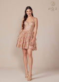 Elegant rose gold tiered A-line dress by Nox Anabel, featuring sparkling glitter detail and a flattering silhouette.