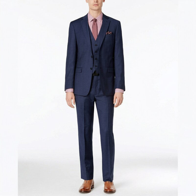 Men's blue tonal windowpane suit with blazer, vest, and matching trousers
