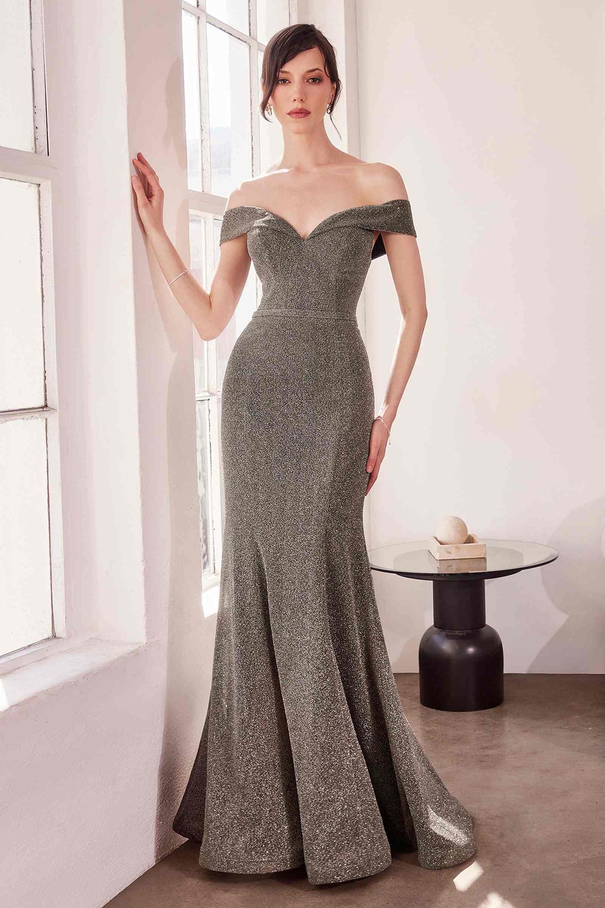 Off-shoulder sweetheart prom gown in dark charcoal glitter, fitted bodice, mermaid hem.